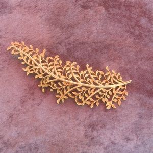 Large golden olive branch brooch